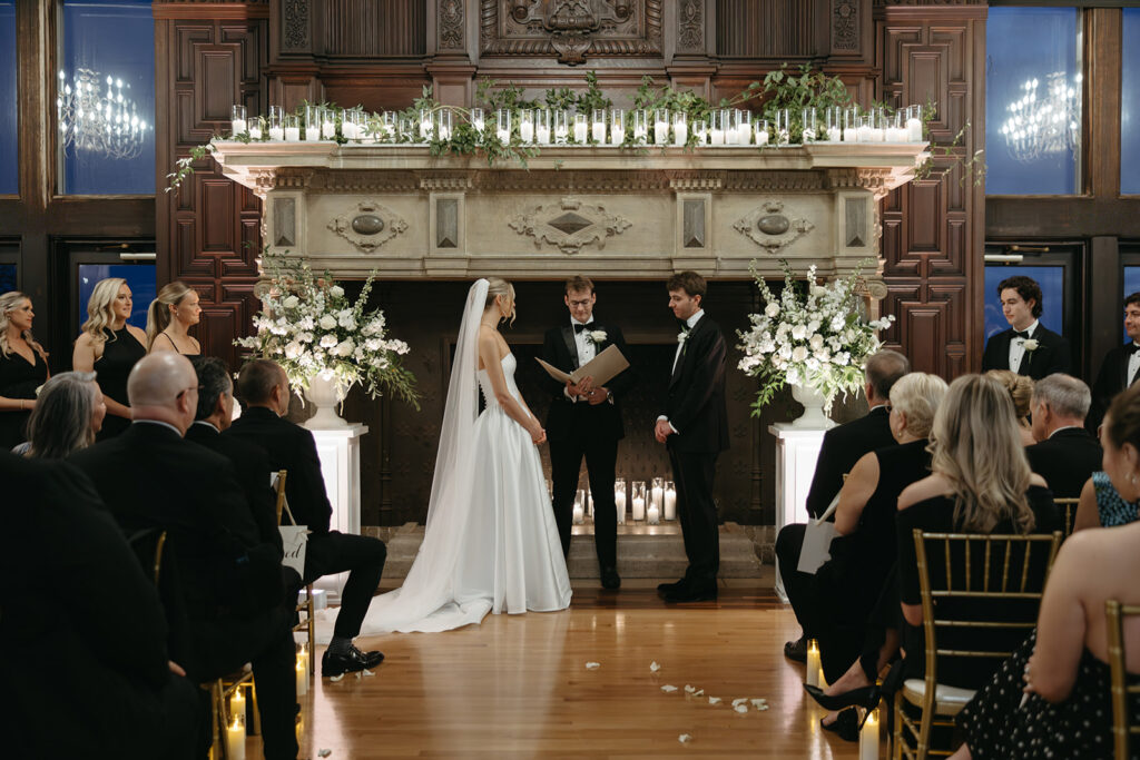 candle lit ceremony in front of the fireplace