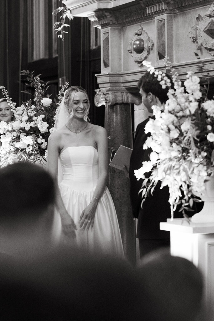 brides reaction to vows during ceremony
