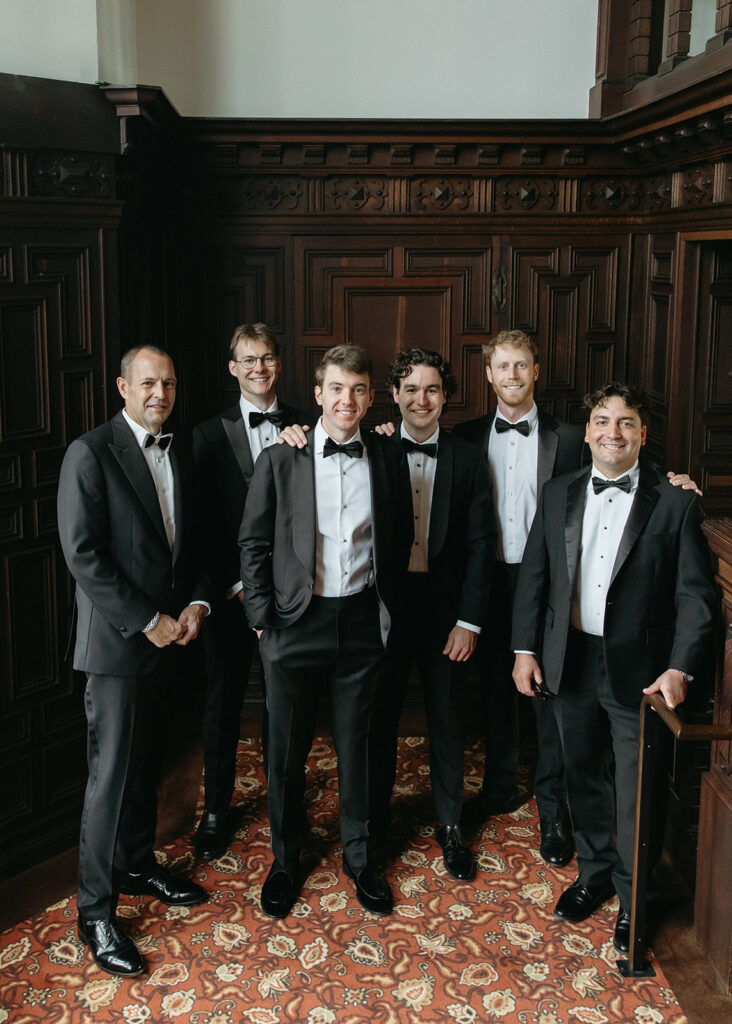 groom and groomsmen together before the grooms first look