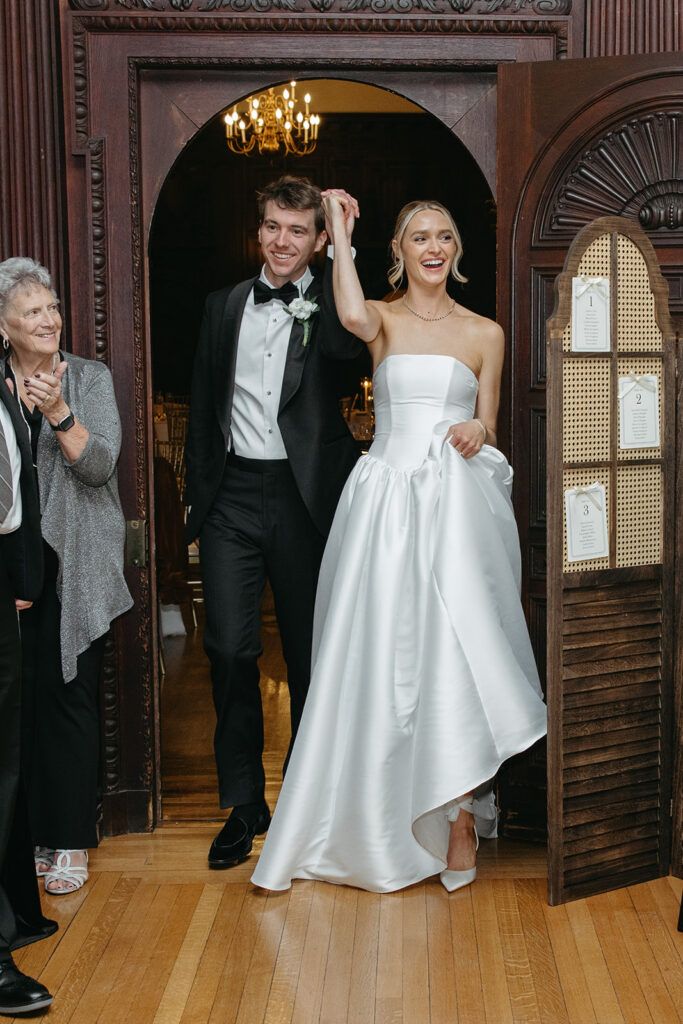 bride and groom entrance to their reception