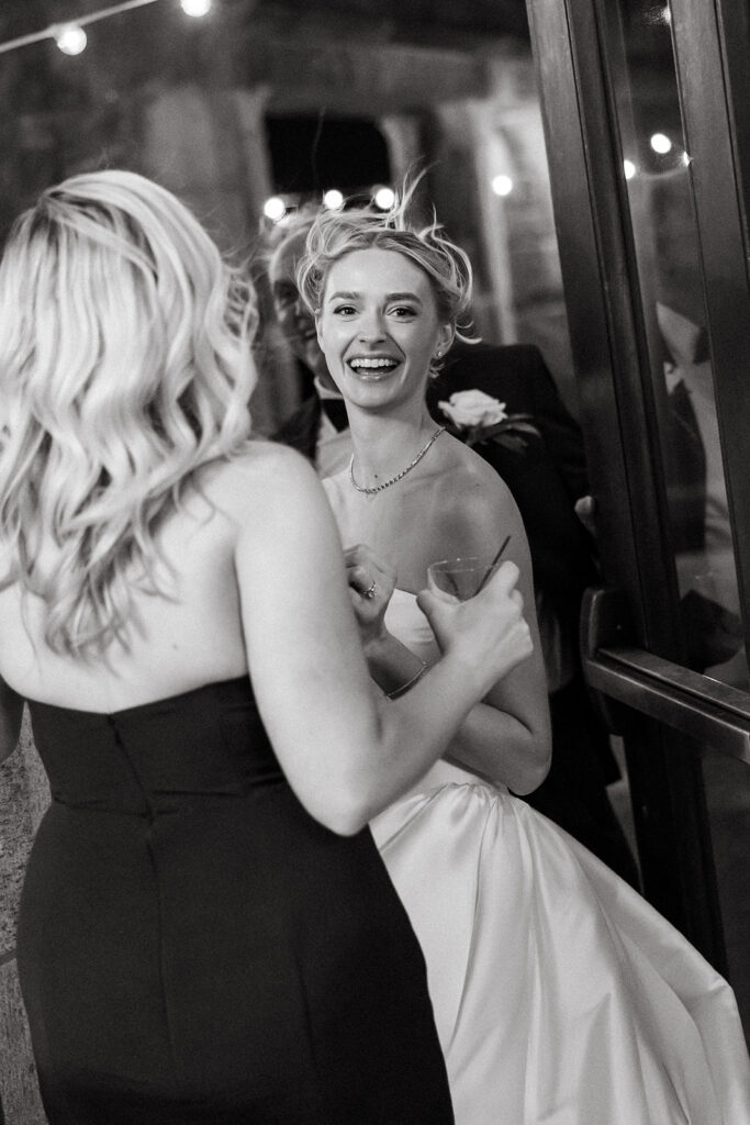 a quick outside breather where the bride caught a gust of wind